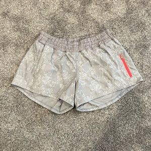Lululemon old style grey floral tracker shorts. Size 8